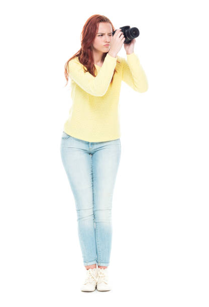 istock Female photographer 1173586044