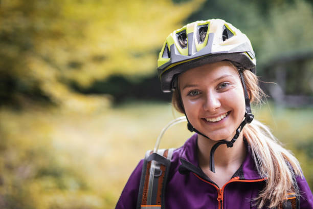 istock Woman riding bicycle in nature 1173587361