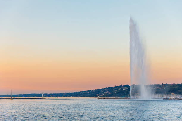 Fountain Jet d'eau at sunset in Geneva, Switzerland stock photo