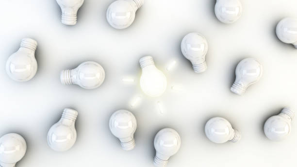 istock Light bulbs and one of them is illuminated 1173589273