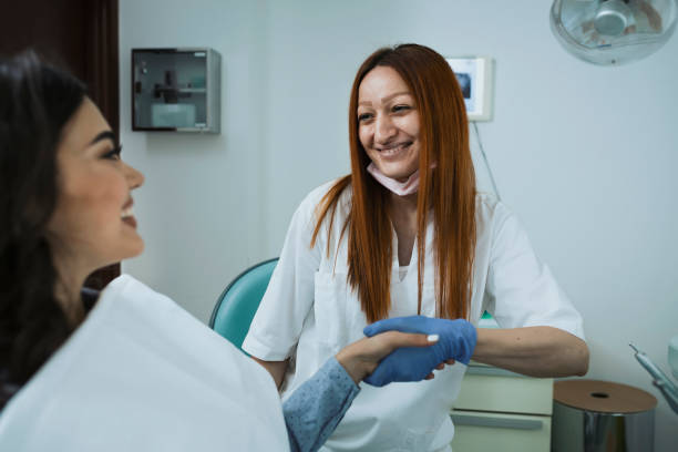 istock Young Patient is Greeting with her Doctor 1173589711