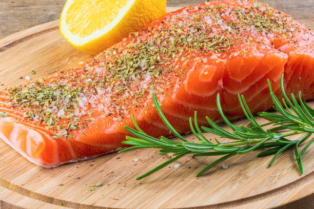istock Salmon Fillet on wooden table 1173592183