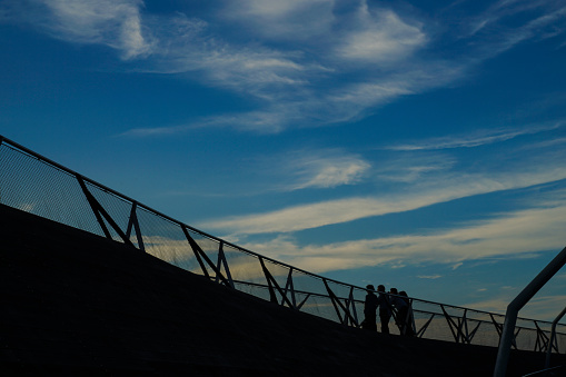 Silhouette of people who walk the large pier. Shooting Location: Yokohama-city kanagawa prefecture