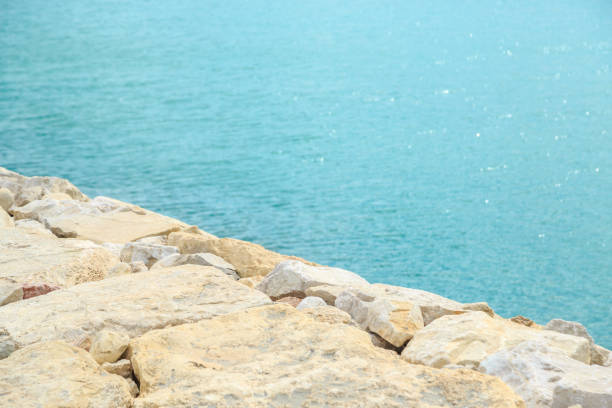 istock background of stones overlooking the blue sea. selective focus 1173595303