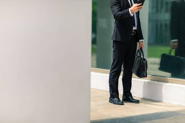 istock A businessman wailking in the building 1173596144