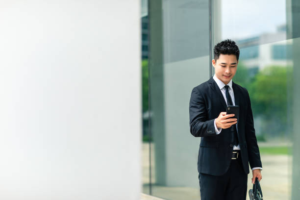 istock A businessman looking at the phone 1173596203
