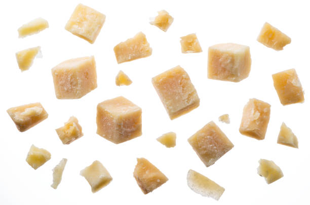 istock Parmesan cheese cubes and parmesan crumbs on white background. Clipping path. 1173596554