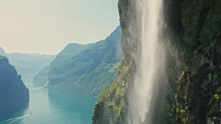 Following waterfall in geirangerfjord