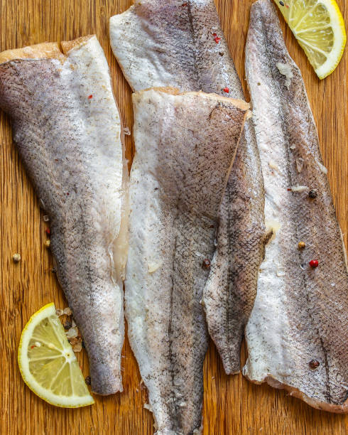istock fish raw hake (set of ingredients for cooking). food background. top view. copy space 1173597973