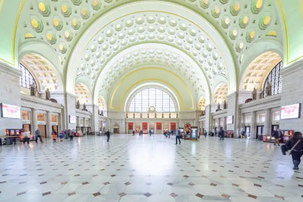 Photo of Inside Union Station in capital city, arches architecture in main hall, Wahington D.C., USA