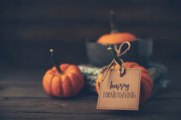 istock Thanksgiving still life with pumpkins and holiday message 1173602790