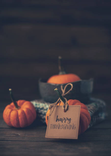 istock Thanksgiving still life with pumpkins and holiday message 1173602803