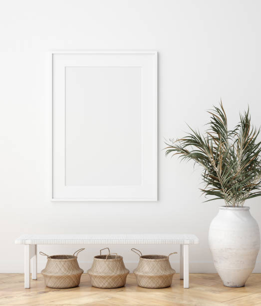 istock Mock up poster in Scandinavian interior with bench, baskets and palm branches in pots 1173603986