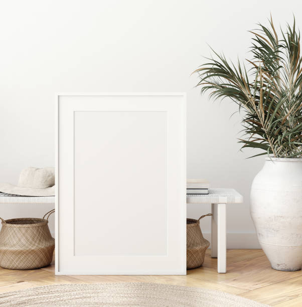 istock Mock up poster in Scandinavian interior with bench, baskets and palm branches in pots 1173603990