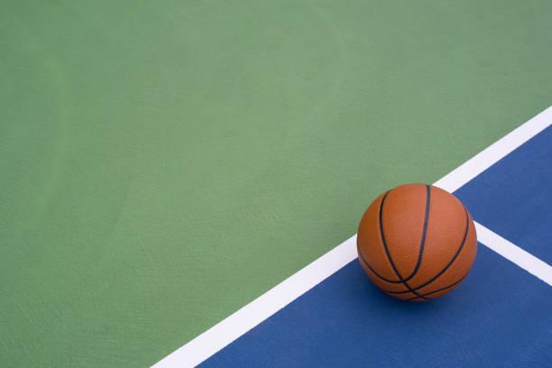 istock Basketball rests on court 1173611139
