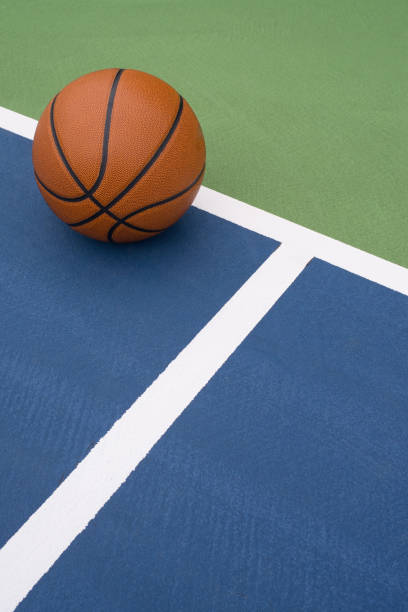 istock Basketball rests on court 1173611140