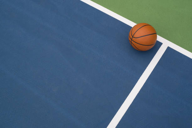 istock Basketball rests on court 1173611153