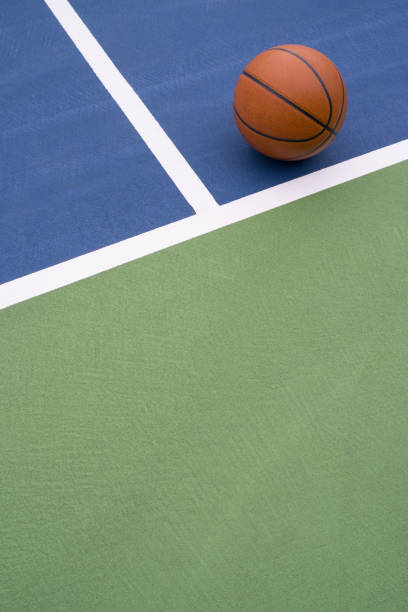 istock Basketball rests on court 1173611184