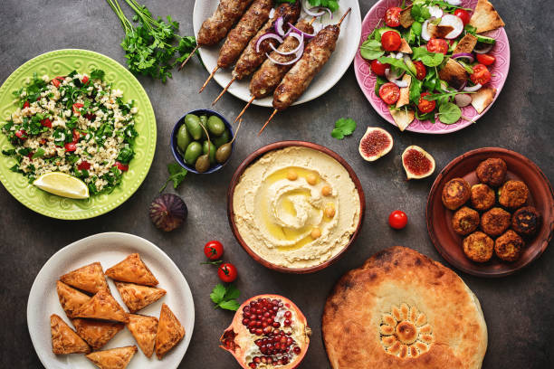 Traditional Middle Eastern or Arabic dinner table. Halal food. Top view, flat lay. Traditional Middle Eastern or Arabic dinner table. Halal food. Top view, flat lay jordan middle east photos stock pictures, royalty-free photos & images