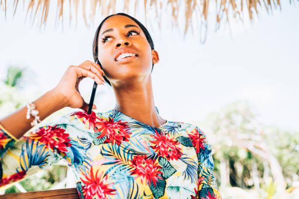 istock Young Black woman at resort cabana 1173613671