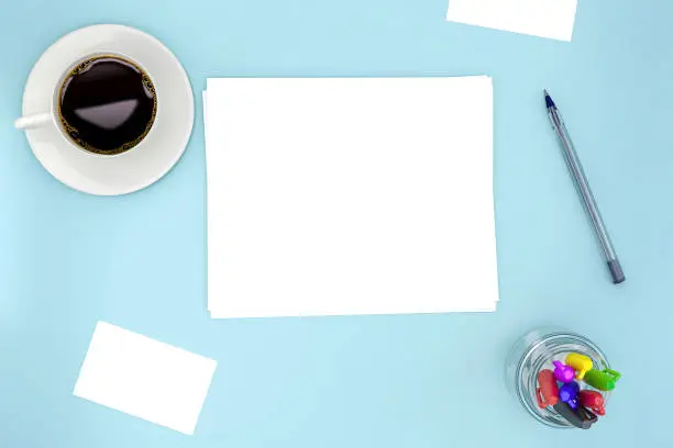 Blank white paper sheets mock-up on light blue background with cup of coffee and pens and some cards. 3D Render Illustration of realistic mockup design.