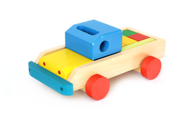 Wooden toy on a white background. Car