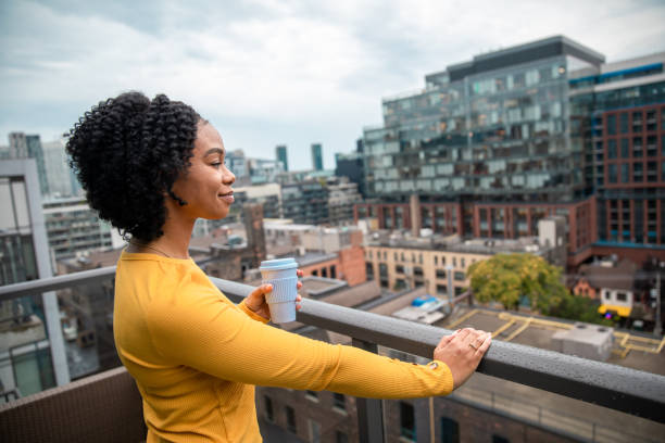 Woman Holding a Reusable Cup