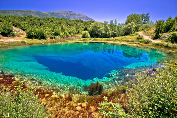 istock Cetina river source or the eye of the Earth landscape view 1173617771