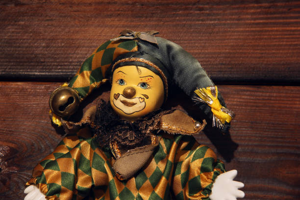 istock Clown on wooden background 1173617964