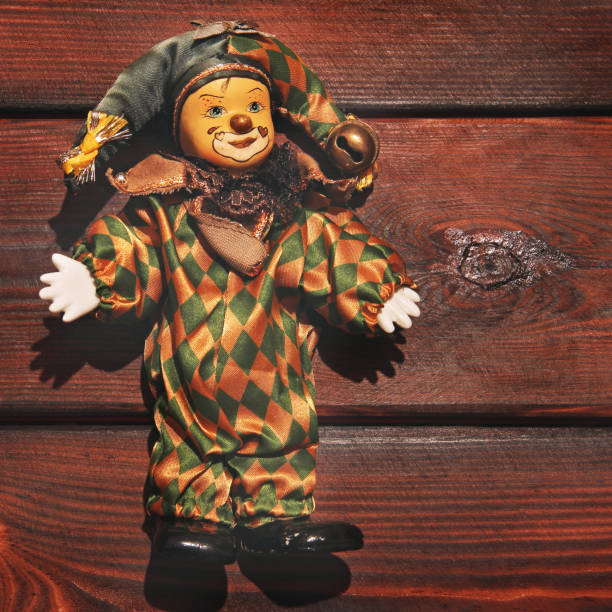 istock Clown on wooden background 1173618011