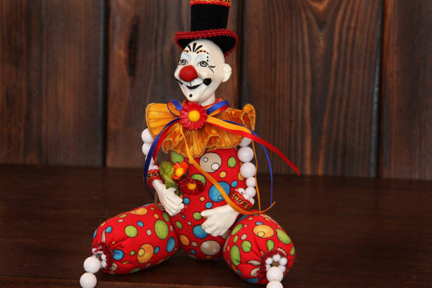 istock Clown on wooden background 1173618129