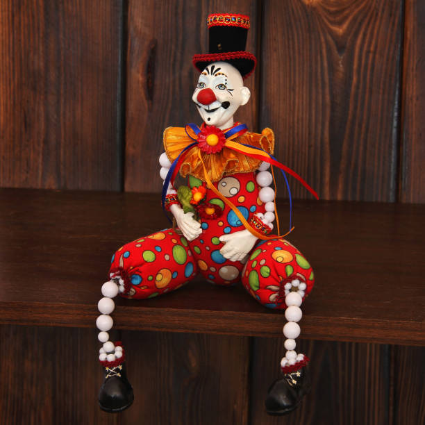 istock Clown on wooden background 1173618151