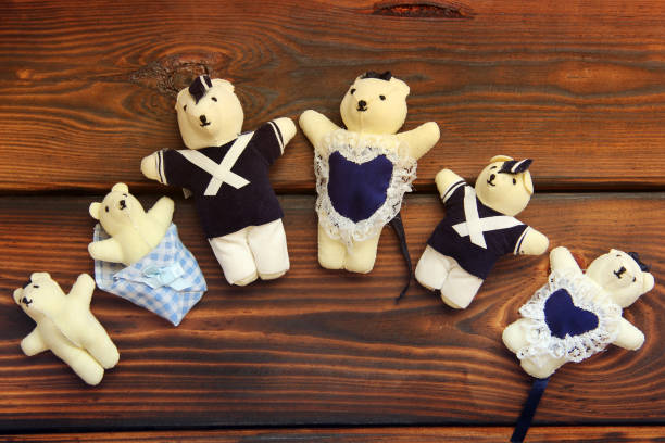 Stuffed toys on wooden background. Bears