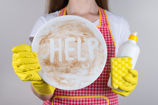 Cropped close up photo of unhappy asking to help her woman worker tired of piles stacks of dirty crockery utensils at home isolated grey background