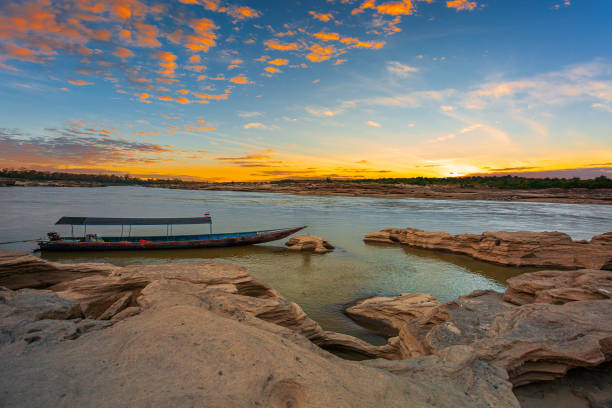 istock Sunrise landscape photo with boat, mountain,Sam Phan Bok, Ubon Ratchathani, Thailand 1173623484