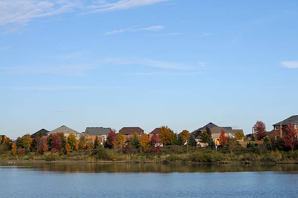 istock Homes along the pond 117362606