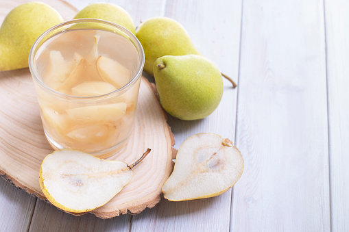 Homemade pears compote, fresh summer pear drink