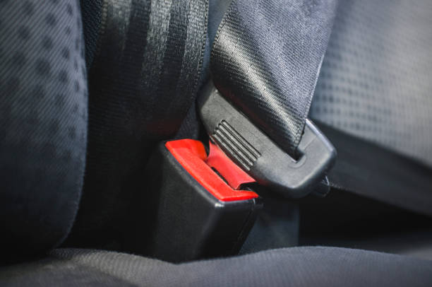 istock car seat belt buckle, close up 1173632645