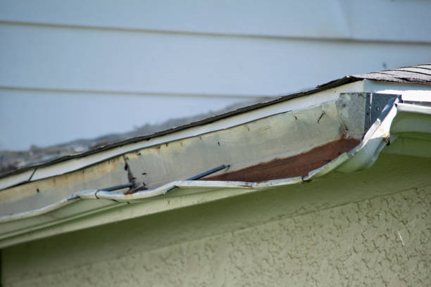 istock Damaged roof and gutter systems on a residential home 1173639949