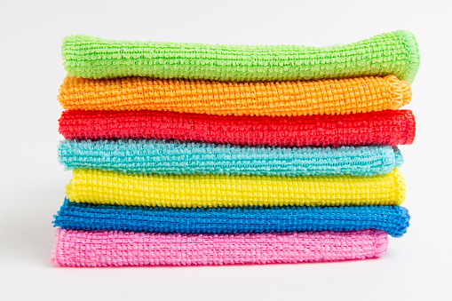 colored microfiber cloths on a white background