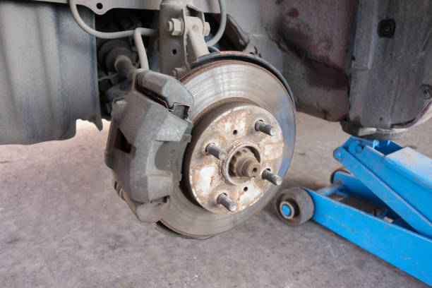 istock Modern car take wheel off show brake disk and caliper assembly 1173641153