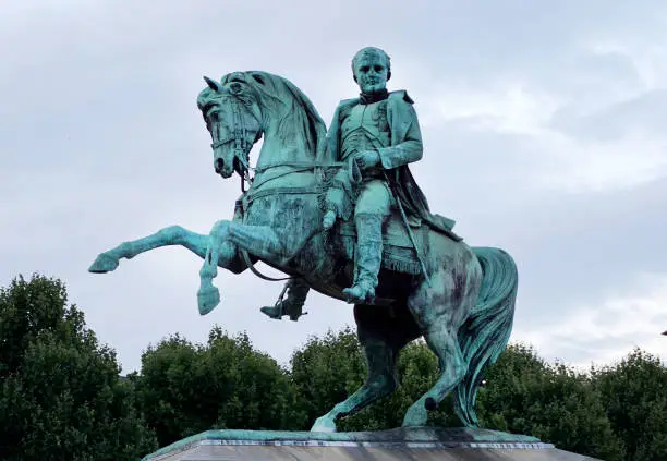 Napoleon on horseback monument in France city of Rouen, summer day.