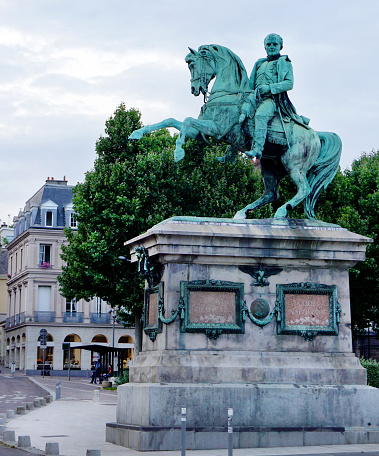 Napoleon on horseback monument in France city of Rouen, summer day.