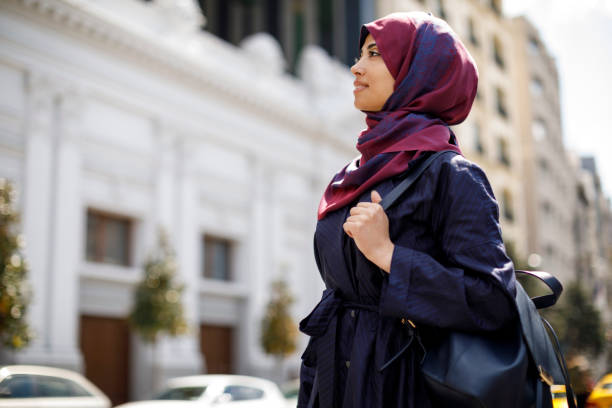 istock Smiling muslim woman travelling 1173641369