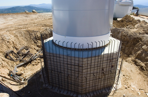 Wind turbine foundation made of concrete with a steel reinforcement.