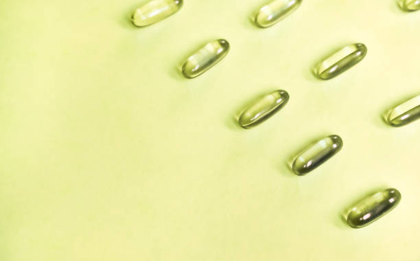 sfondo capsule di gel. - gel capsules foto e immagini stock