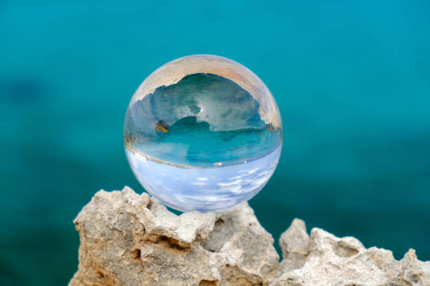 istock Crystal ball on the rock. 1173644869