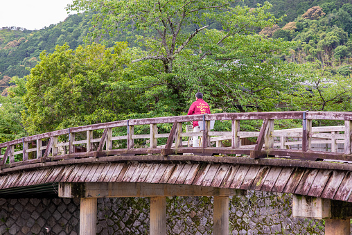 Kyoto, Japan - May 29, 2019: Beautiful scenery at the Nakanoshima Park area in Arashiyama, located on an island accessible by historic bridges.
