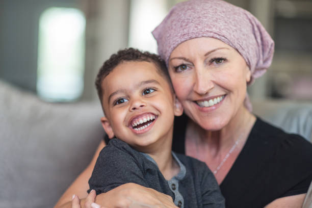 istock Mother with cancer lovingly hugs her toddler son 1173647559