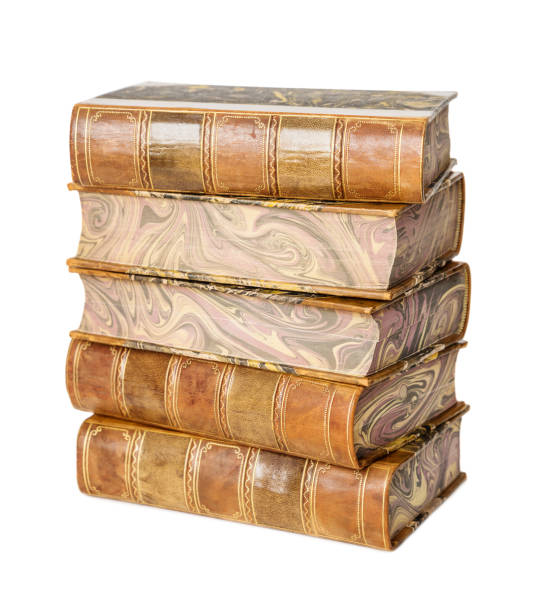 istock Antique books on white background 1173647617